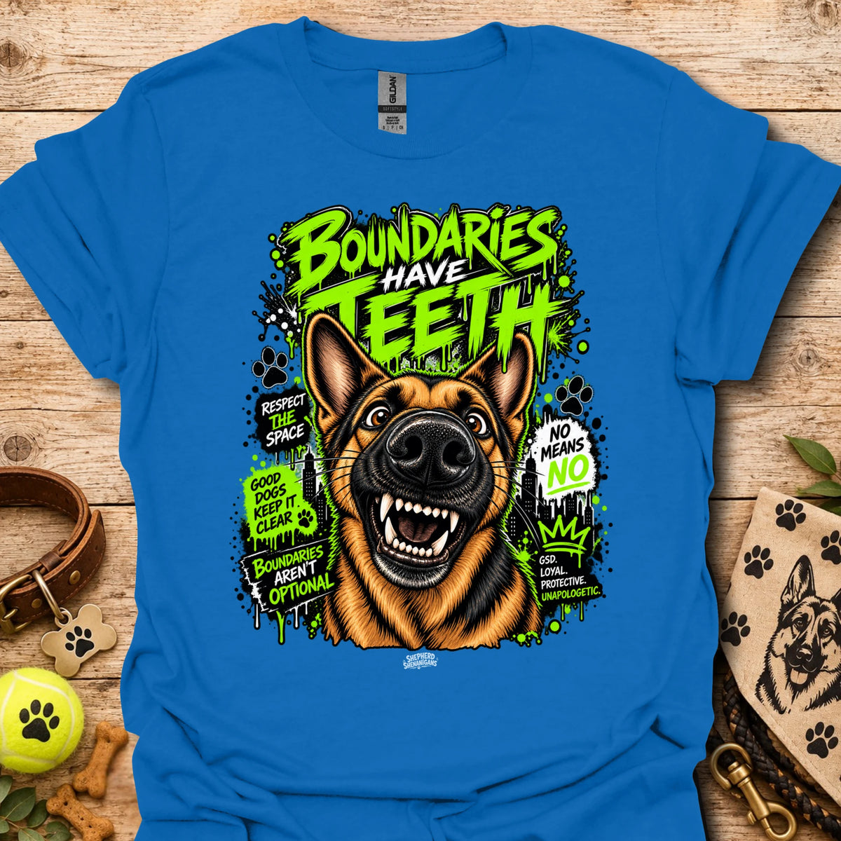 Royal blue T-shirt with colorful dog head graphic and 'Boundaries Have Teeth' text