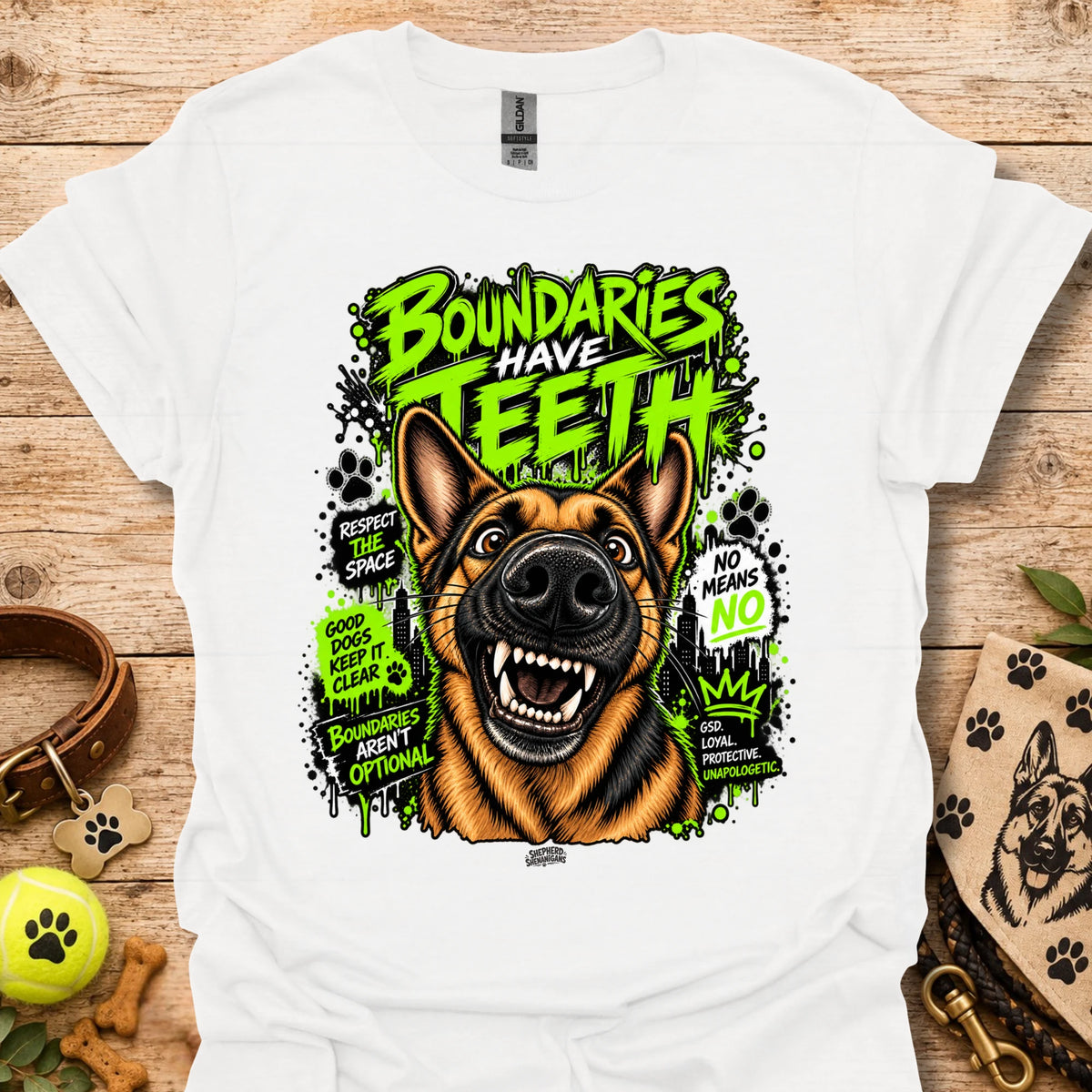 White T-shirt with colorful dog head graphic and 'Boundaries Have Teeth' text