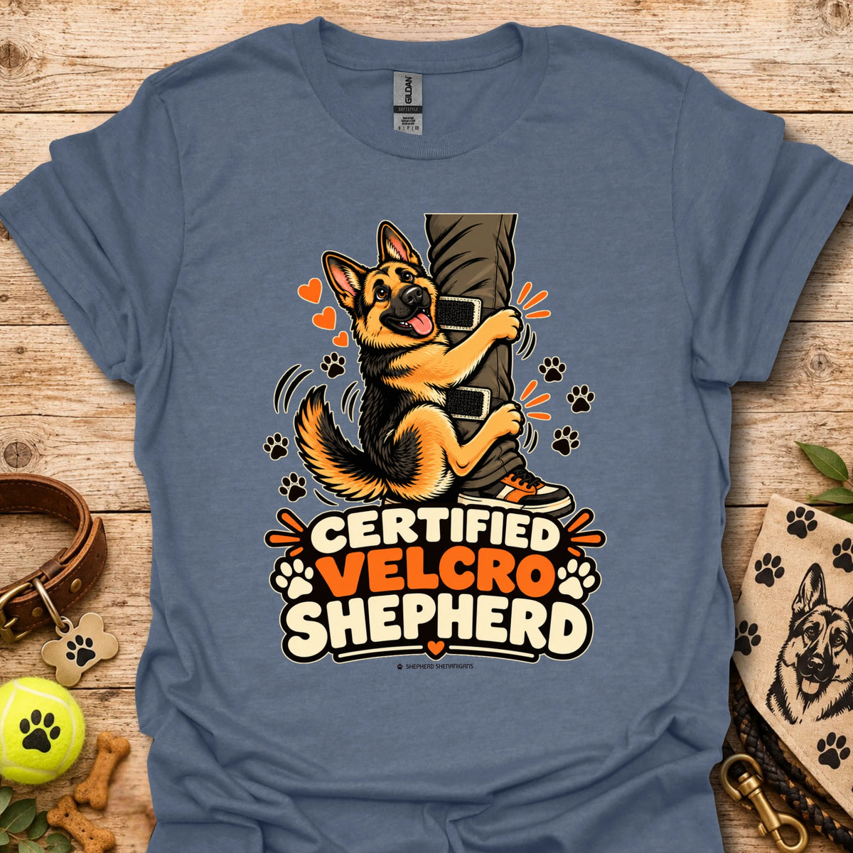 Slate blue T-shirt with “Certified Velcro Shepherd” dog graphic on the front
