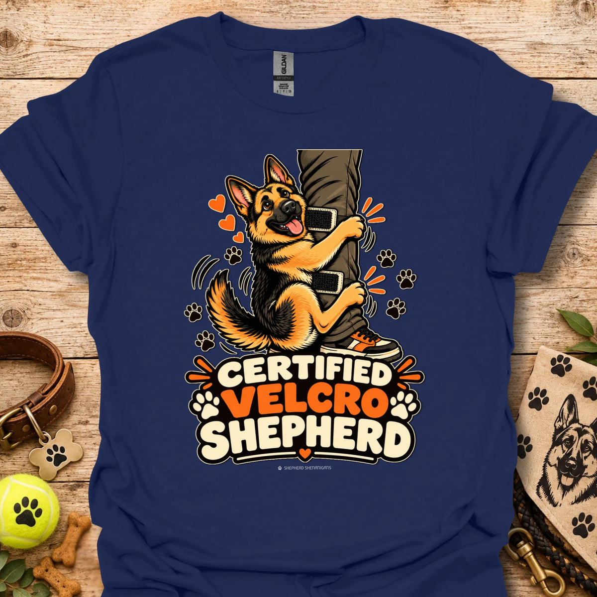 Deep blue T-shirt with “Certified Velcro Shepherd” dog graphic on the front