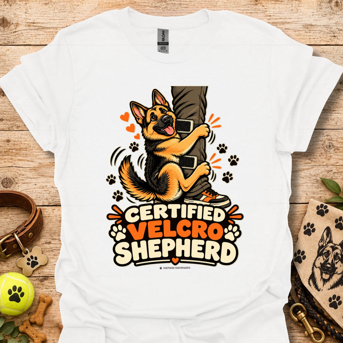 White T-shirt with “Certified Velcro Shepherd” dog graphic on the front