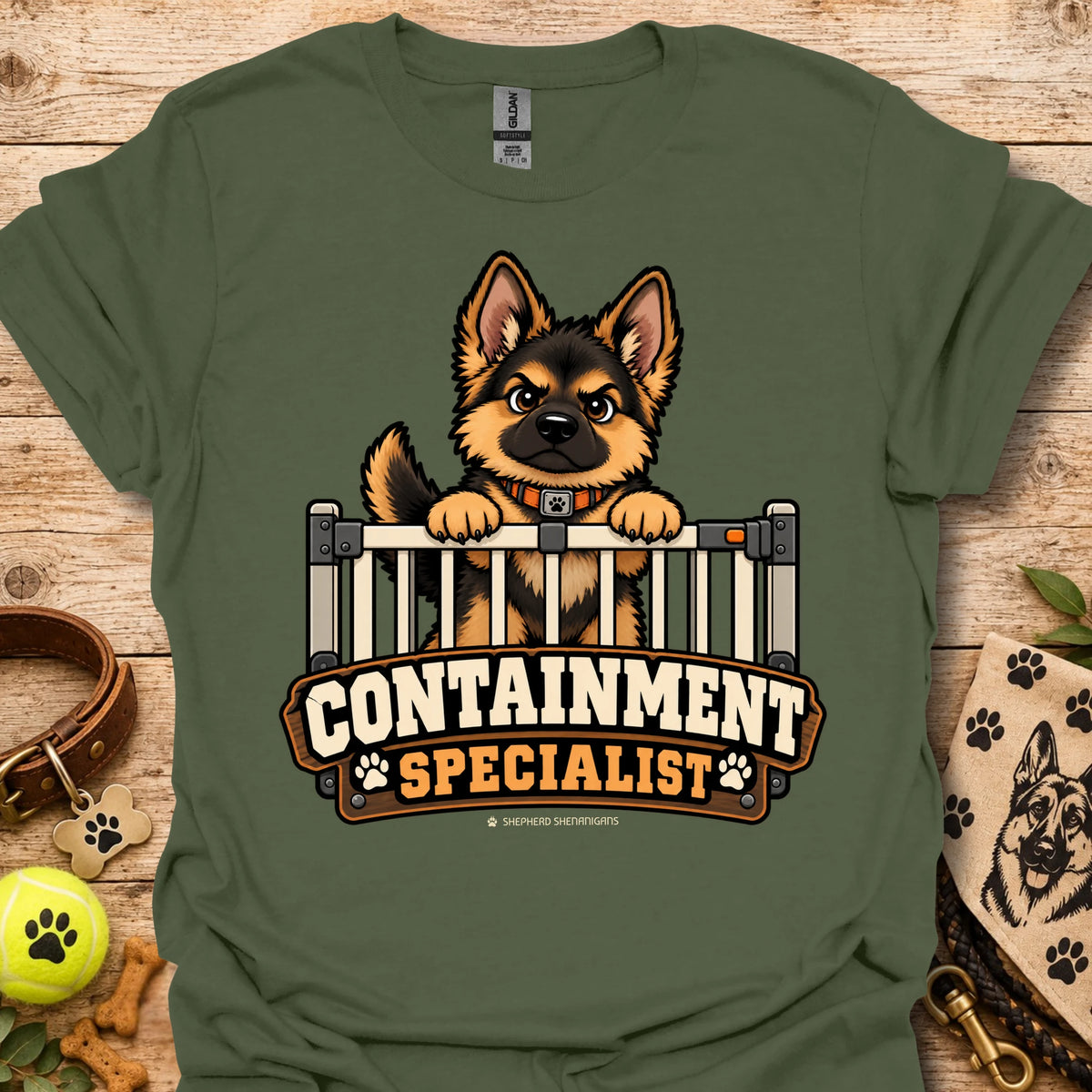 Dark green crewneck t-shirt with cartoon dog behind fence graphic and bold text logo