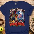 Navy T-shirt with a Christmas dog-and-window graphic and “Silent Night? Wrong House” text