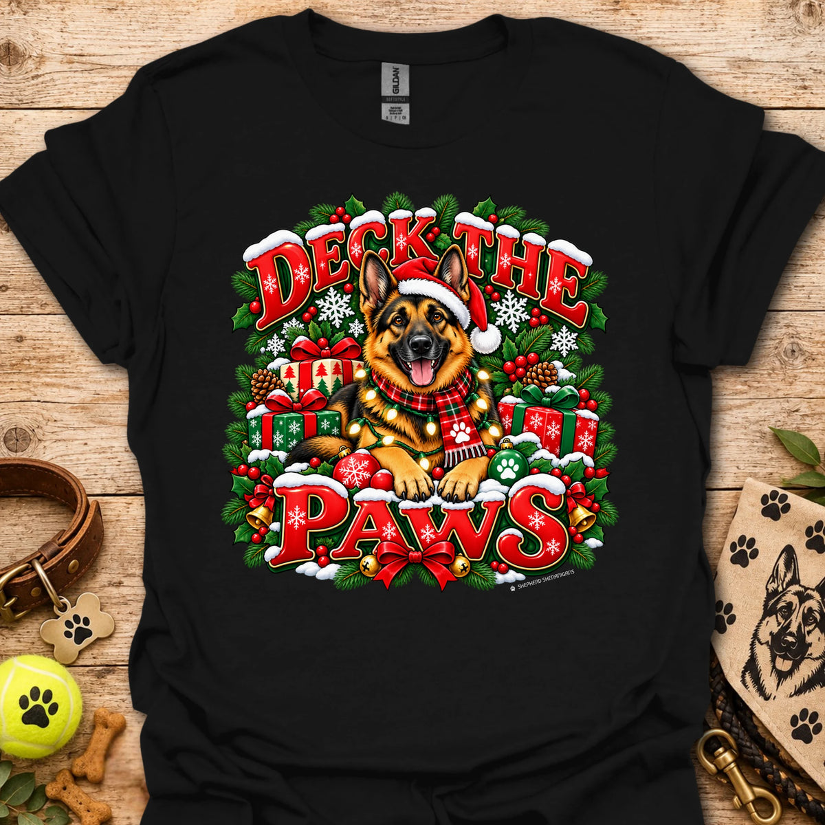Black T-shirt with “Deck the Paws” holiday dog wreath graphic, crew neck
