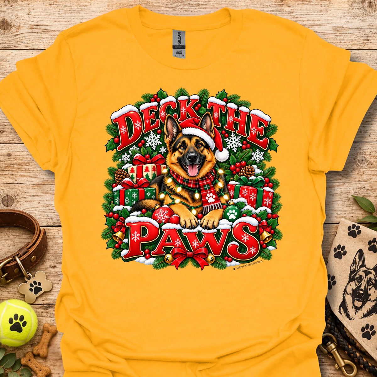 Gold T-shirt with “Deck the Paws” holiday dog wreath graphic, crew neck