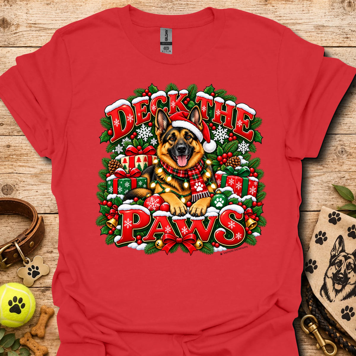 Red T-shirt with “Deck the Paws” holiday dog wreath graphic, crew neck
