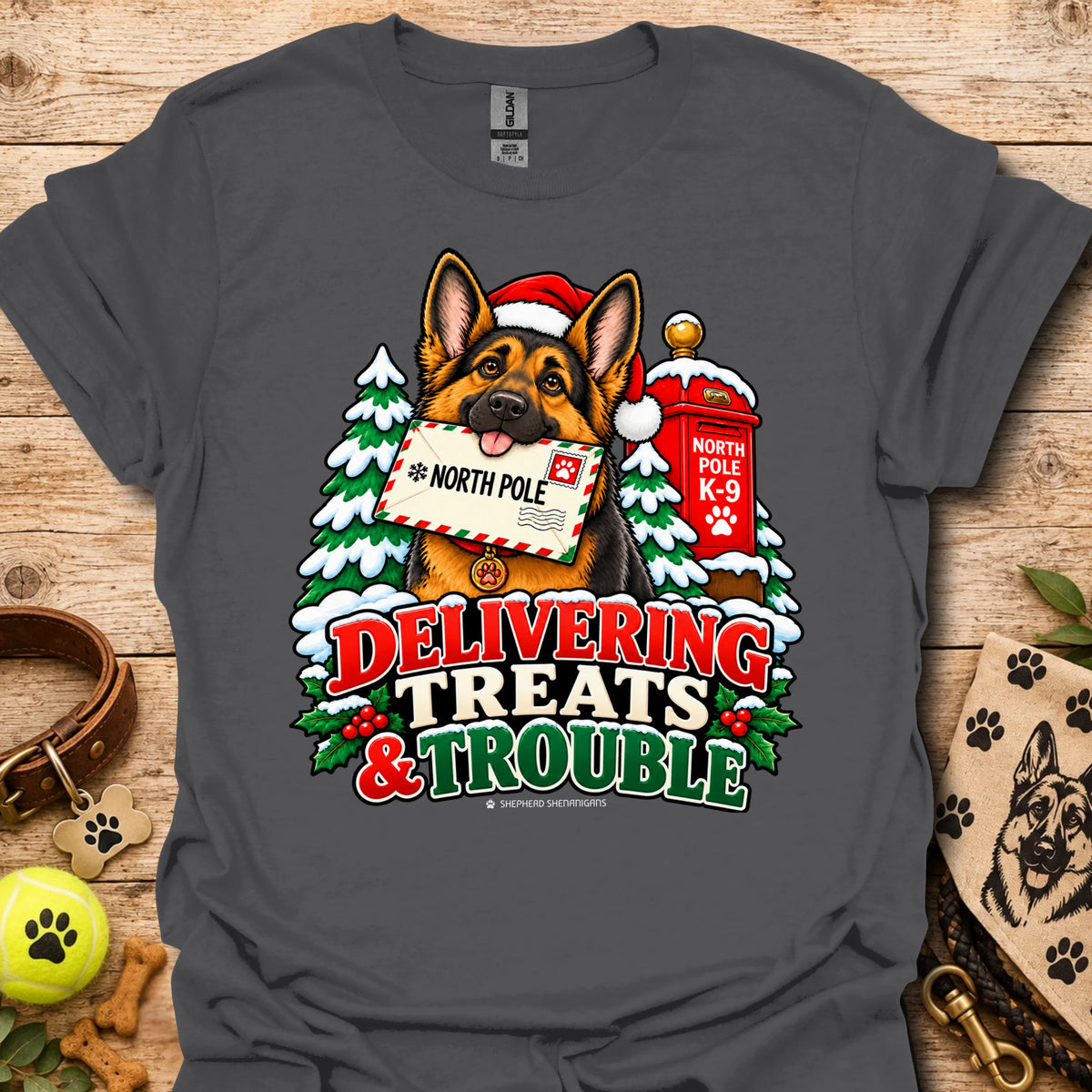 Black T-shirt with colorful dog and holiday "Delivering Treats & Trouble" graphic