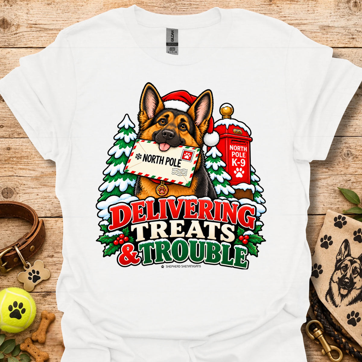 White T-shirt with colorful dog and holiday "Delivering Treats & Trouble" graphic