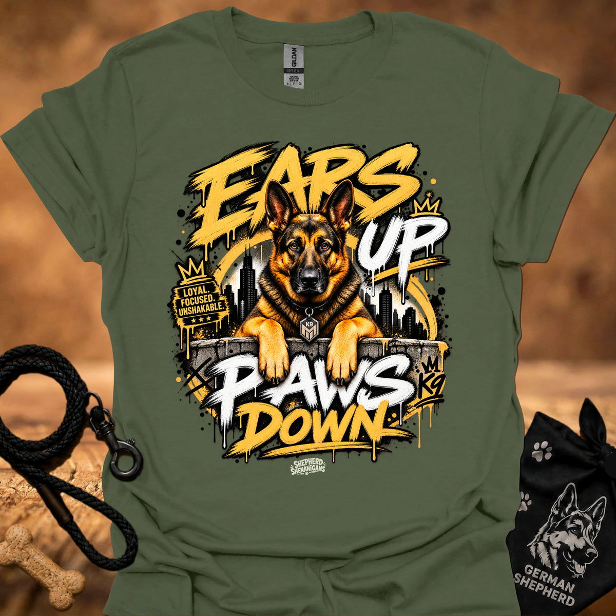 Military green t-shirt with centered German shepherd “Ears Up Paws Down” graphic artwork.
