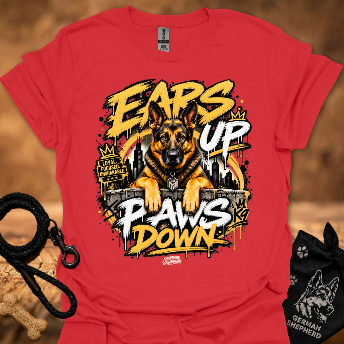 Red t-shirt with centered German shepherd “Ears Up Paws Down” graphic artwork.