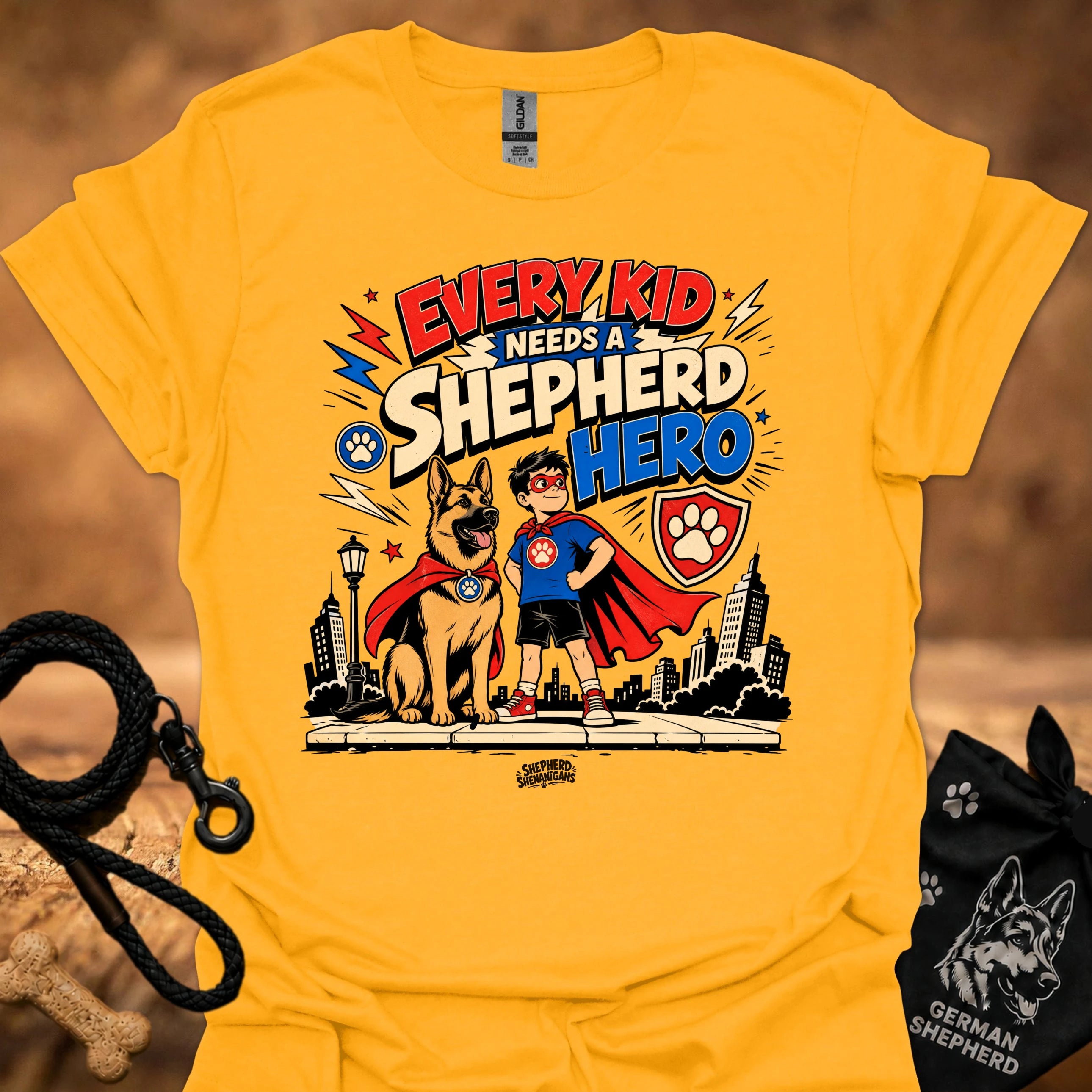 Gold kids' shepherd hero graphic t-shirt with dog and child superhero illustration