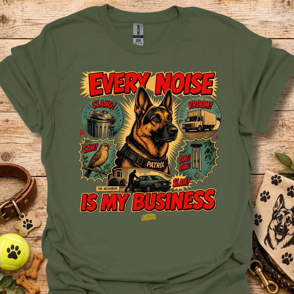 Military green graphic T-shirt with dog print and 'EVERY NOISE IS MY BUSINESS' text
