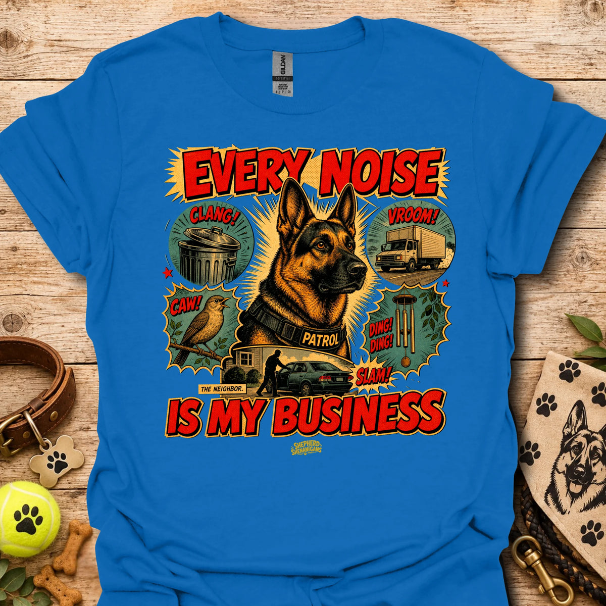 Royal blue graphic T-shirt with dog print and 'EVERY NOISE IS MY BUSINESS' text