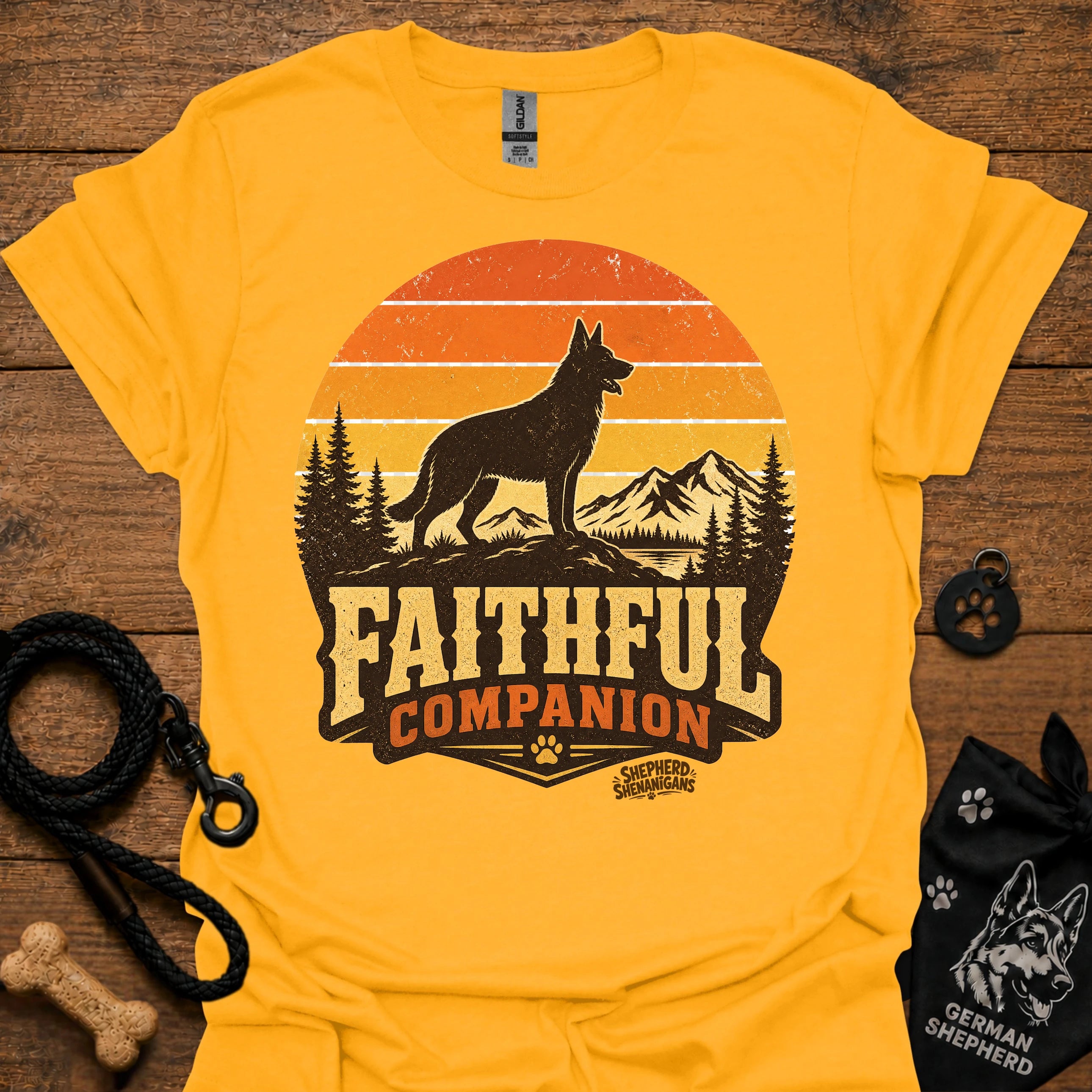Gold T-shirt with black dog and orange Faithful Companion mountain graphic
