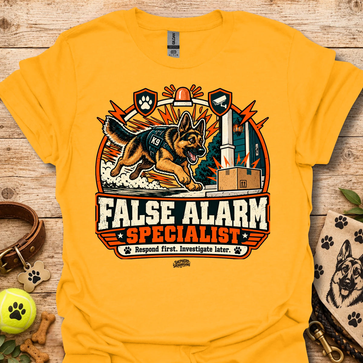 Gold crewneck t-shirt with German shepherd and "False Alarm Specialist" graphic