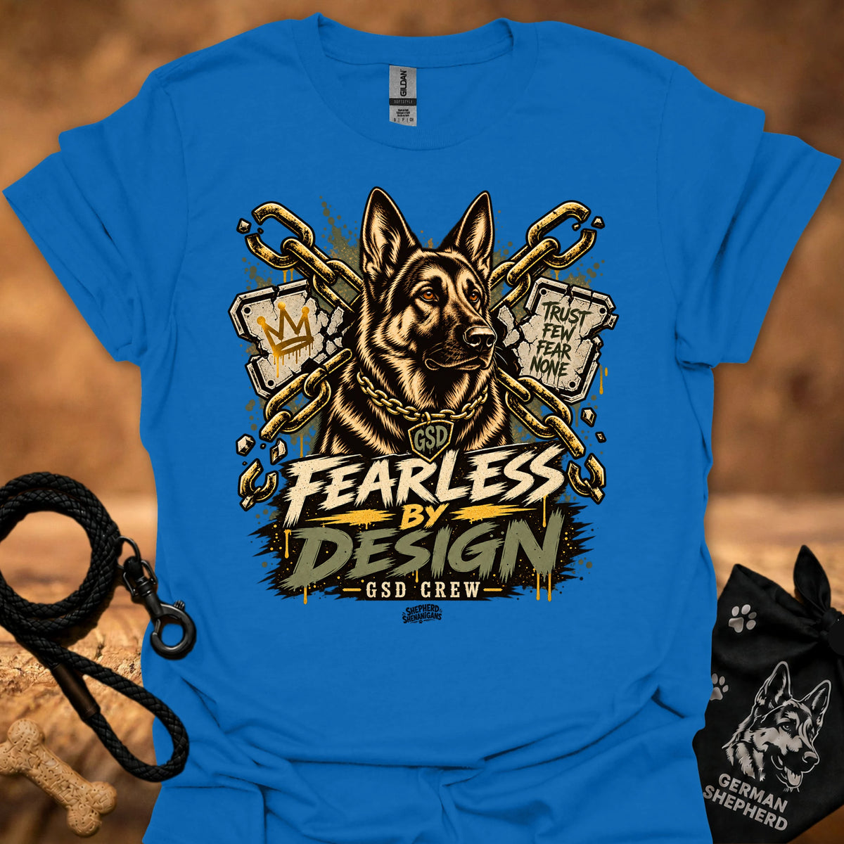 Royal blue graphic crew-neck T-shirt with gold dog head and Fearless by Design lettering