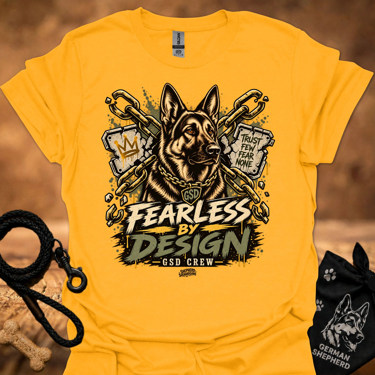 Gold graphic crew-neck T-shirt with gold dog head and Fearless by Design lettering