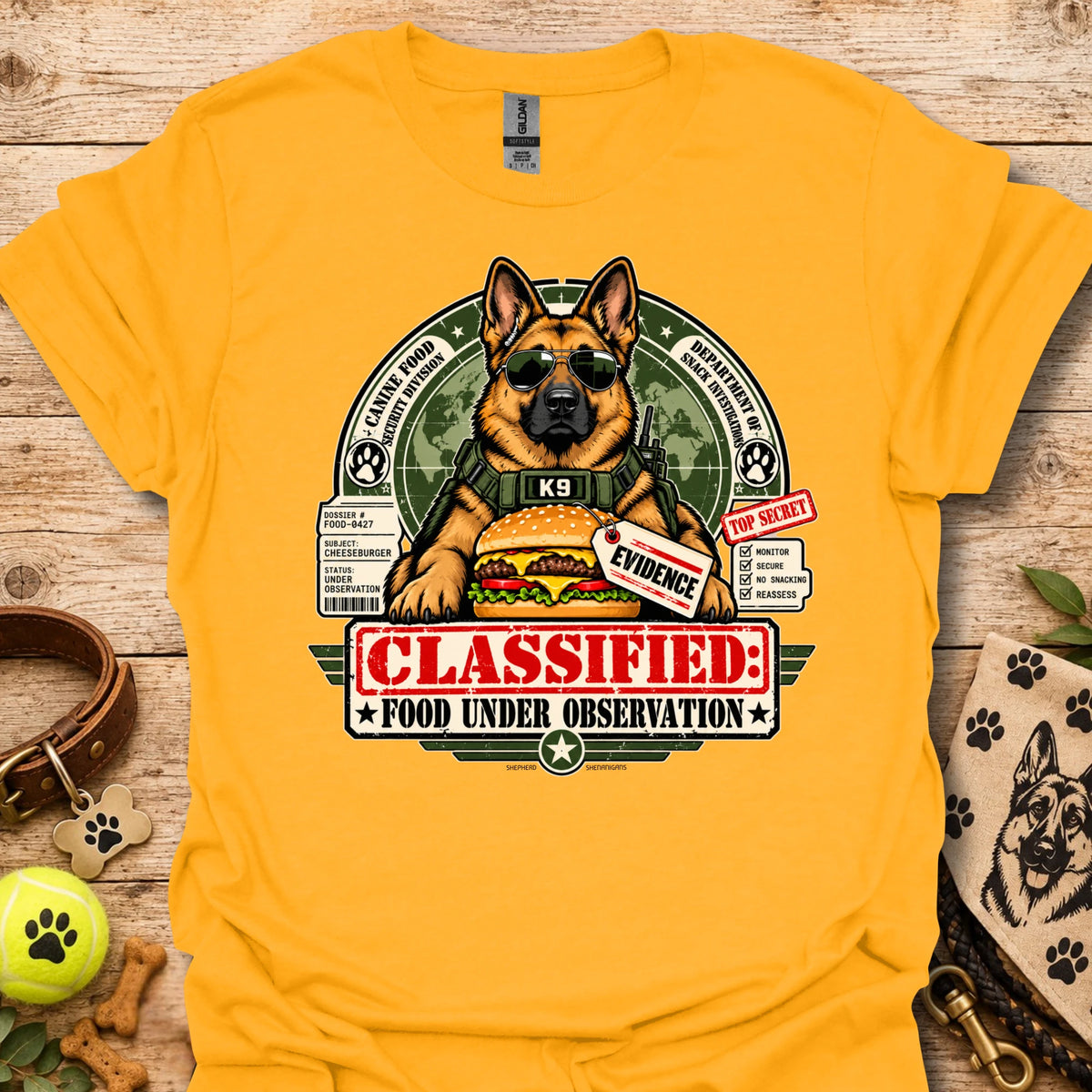 Food Under Observation graphic t-shirt in orange with K9 "CLASSIFIED" dog print