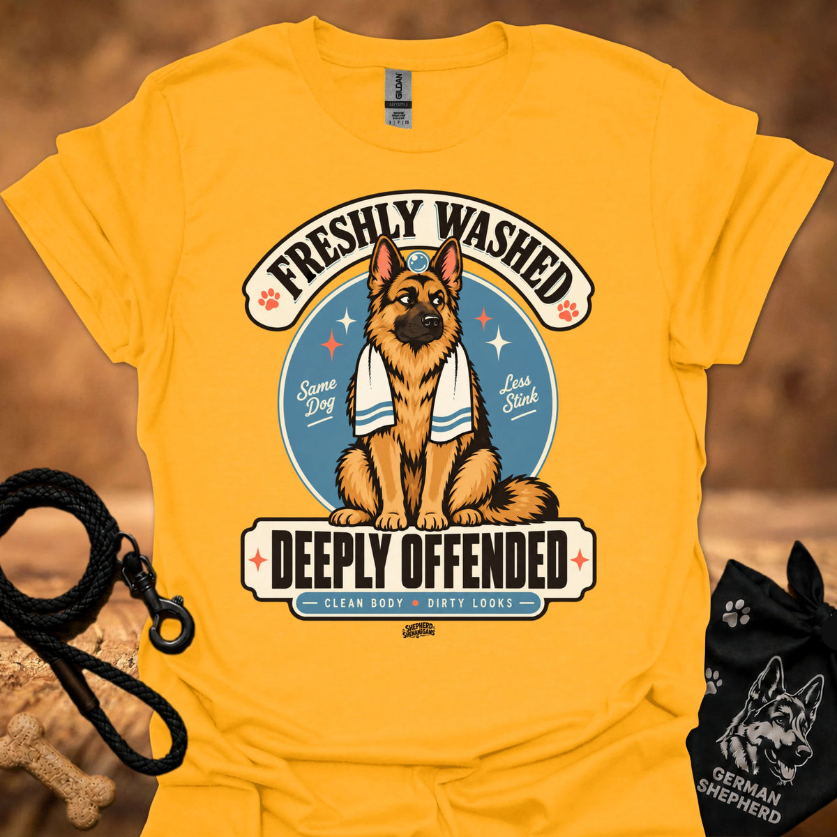 Gold short-sleeve T-shirt with large dog graphic and bold front text