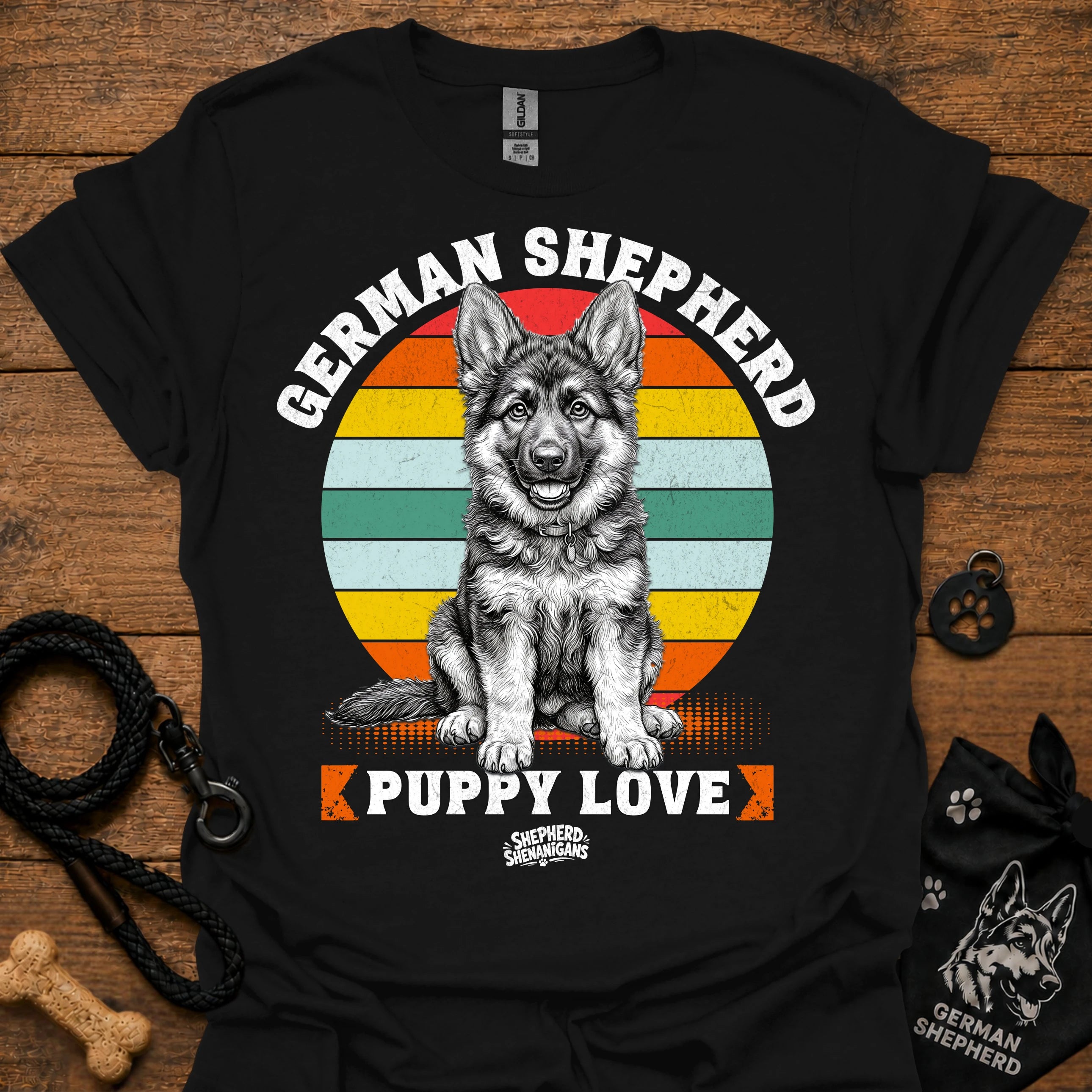 Black T-shirt with a large rainbow German Shepherd puppy graphic on the front