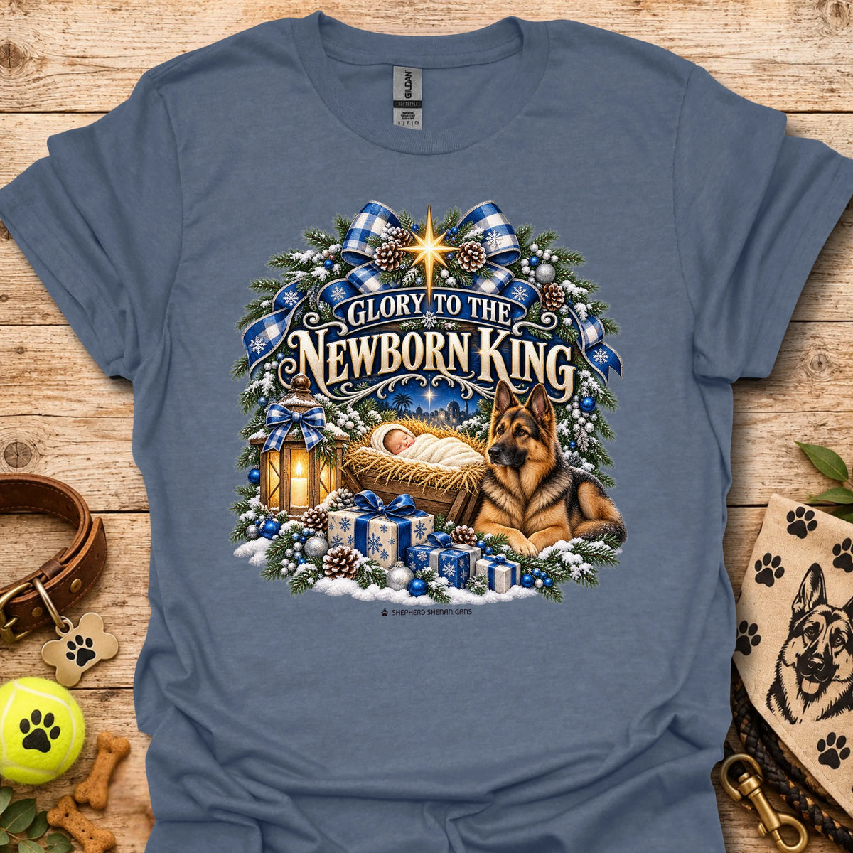 Heather indigo crew-neck T-shirt with blue holiday wreath nativity graphic