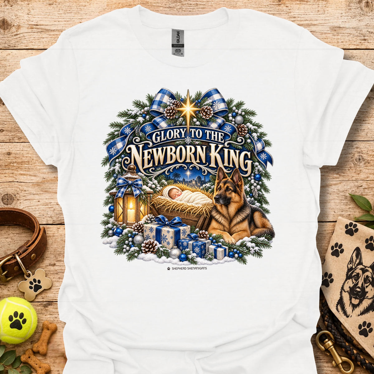 White crew-neck T-shirt with blue holiday wreath nativity graphic