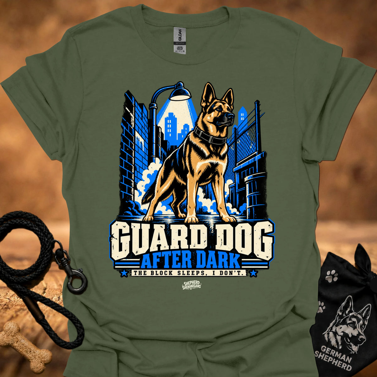 Military green T-shirt with “Guard Dog After Dark” graphic and German shepherd scene