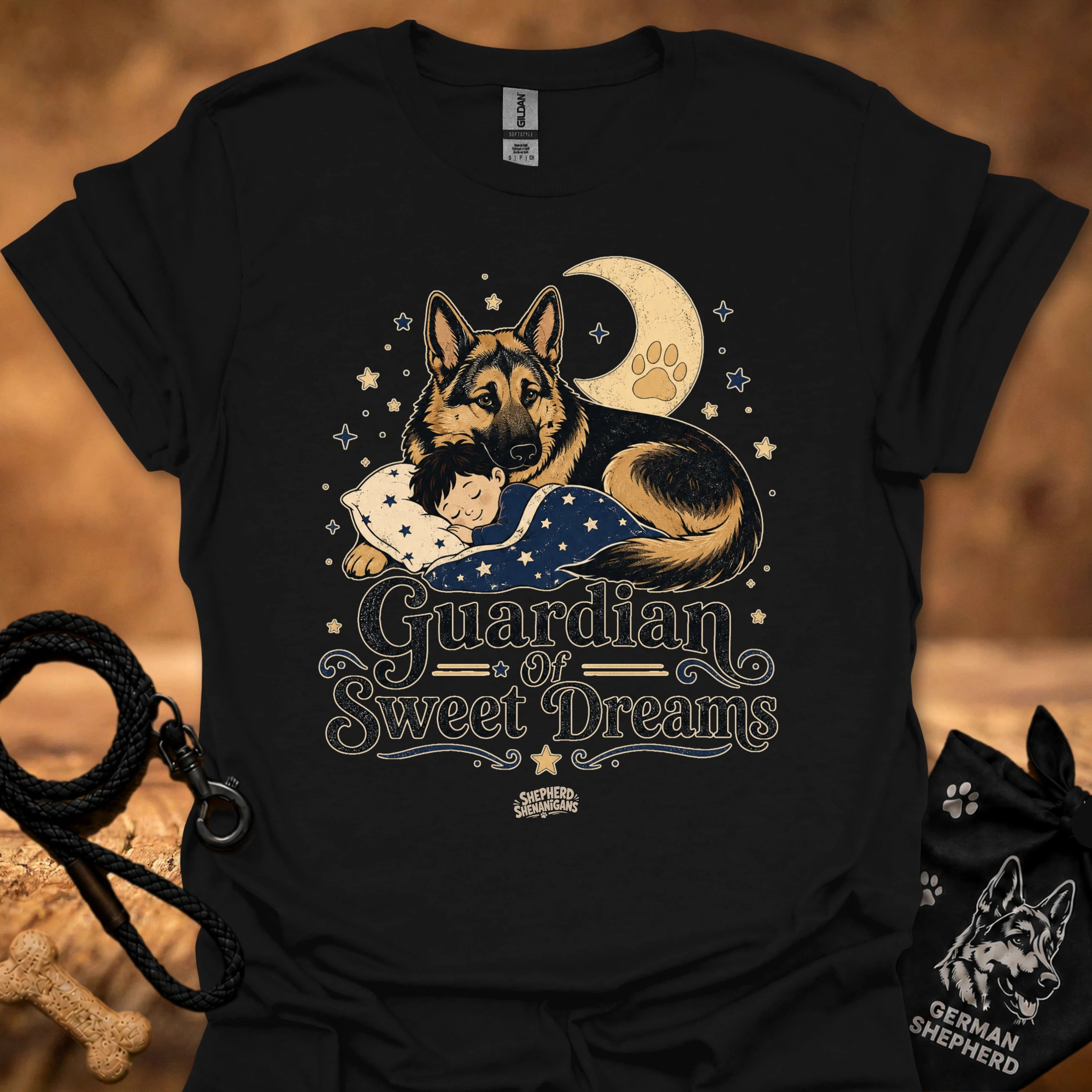 Black T-shirt with front graphic of a German shepherd and sleeping child under moon