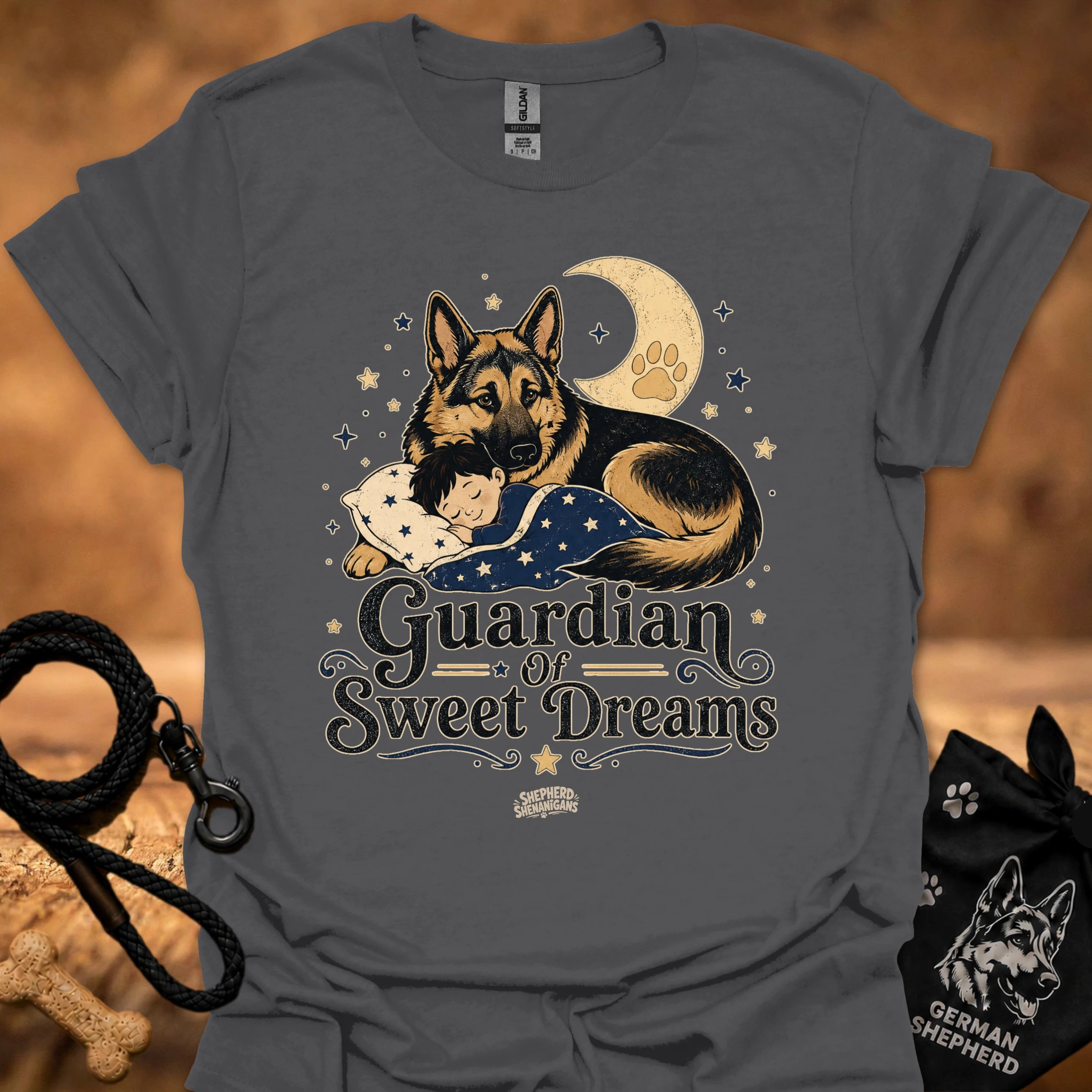 Charcoal T-shirt with front graphic of a German shepherd and sleeping child under moon
