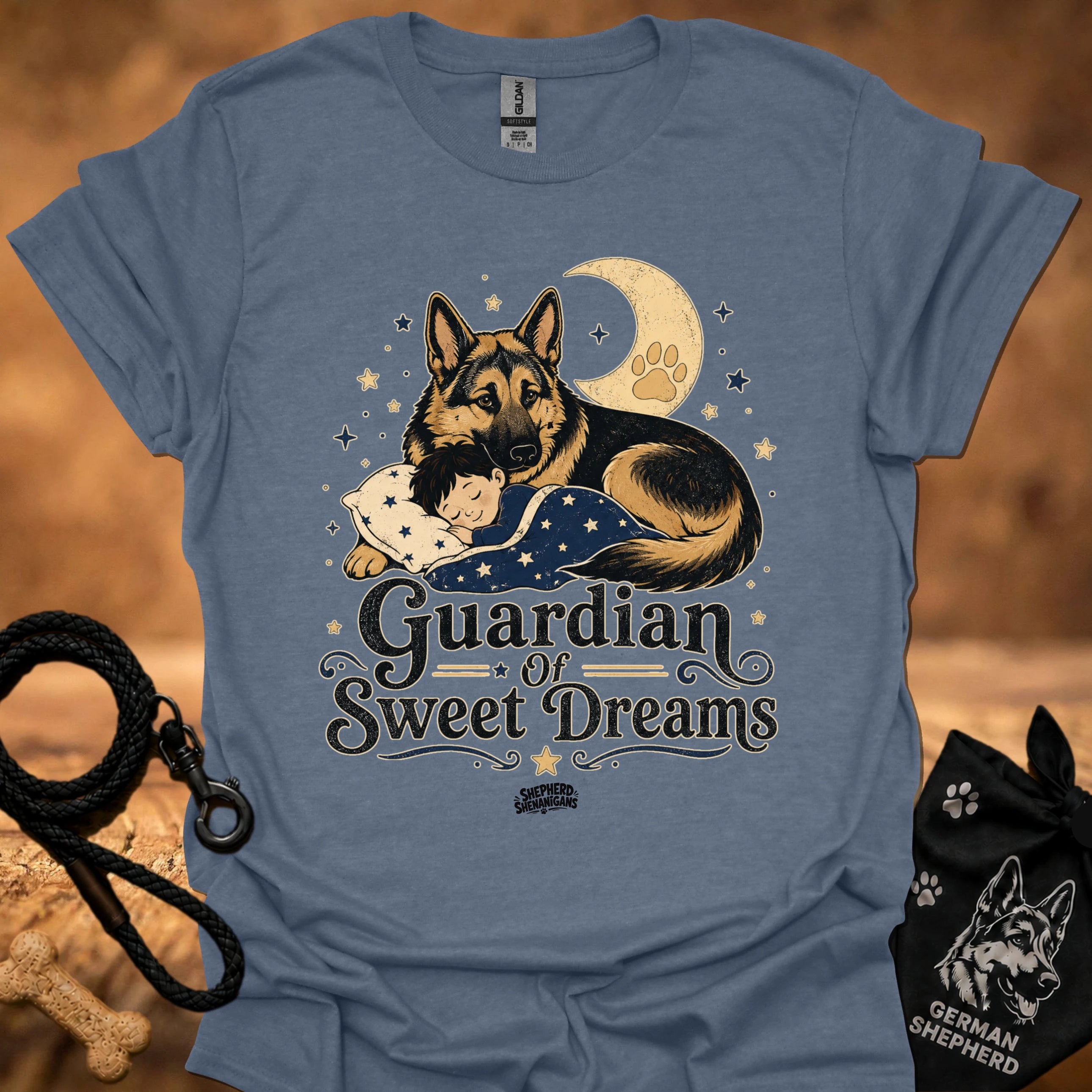 Heather indigo T-shirt with front graphic of a German shepherd and sleeping child under moon