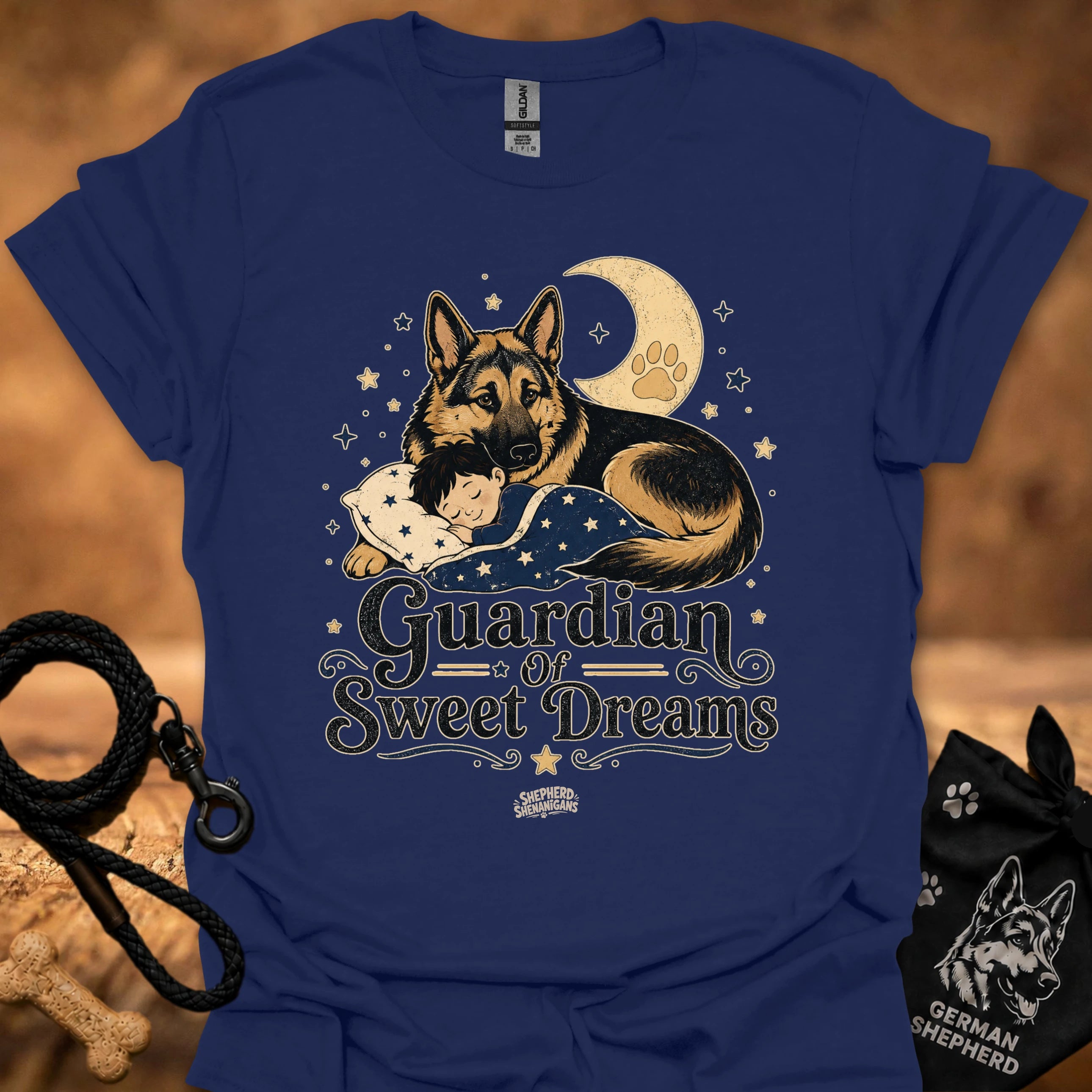 Navy T-shirt with front graphic of a German shepherd and sleeping child under moon
