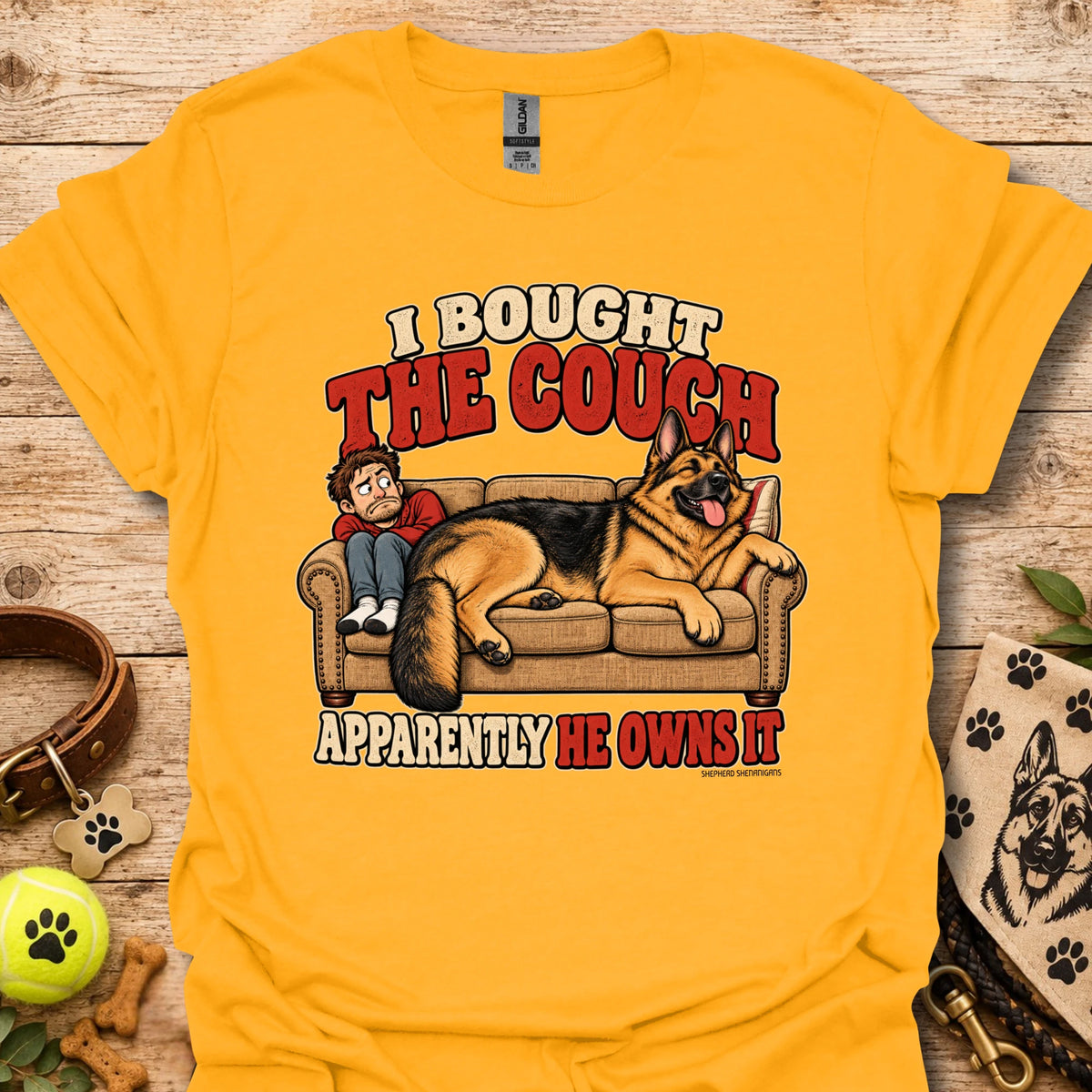 Gold graphic T-shirt with couch and dog cartoon print
