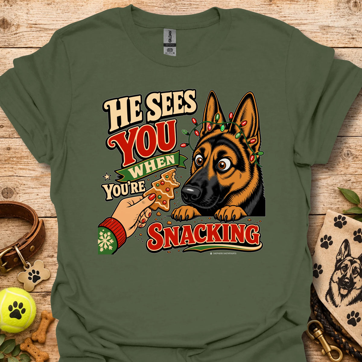 Green T-shirt with cartoon German shepherd and snack-themed text graphic