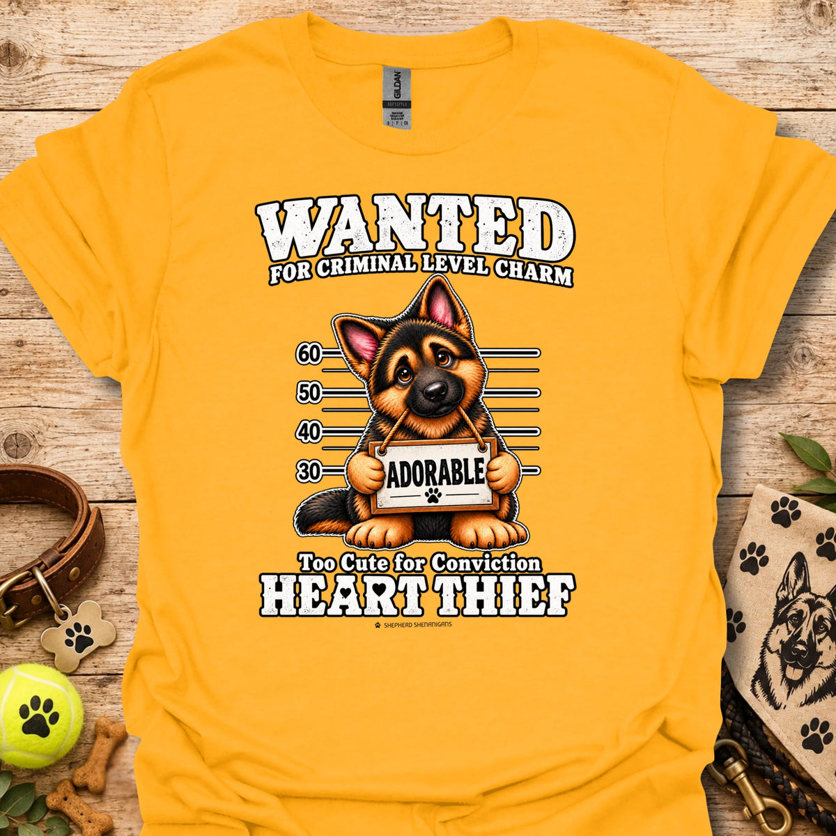 Gold/yellow Heart Thief graphic t-shirt with dog Wanted mugshot-style print