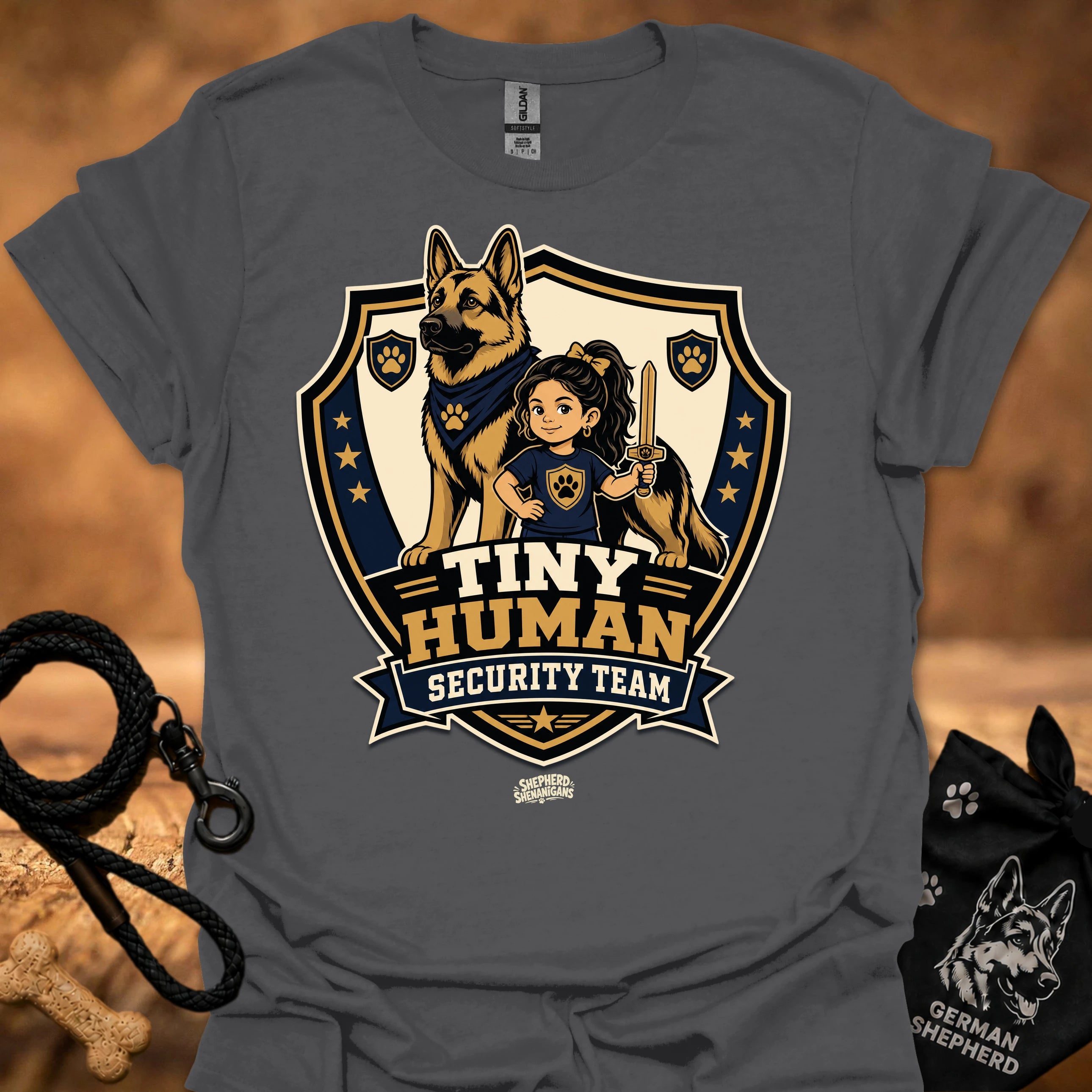 Charcoal T-shirt with shield mascot graphic and “Tiny Human Security Team” print