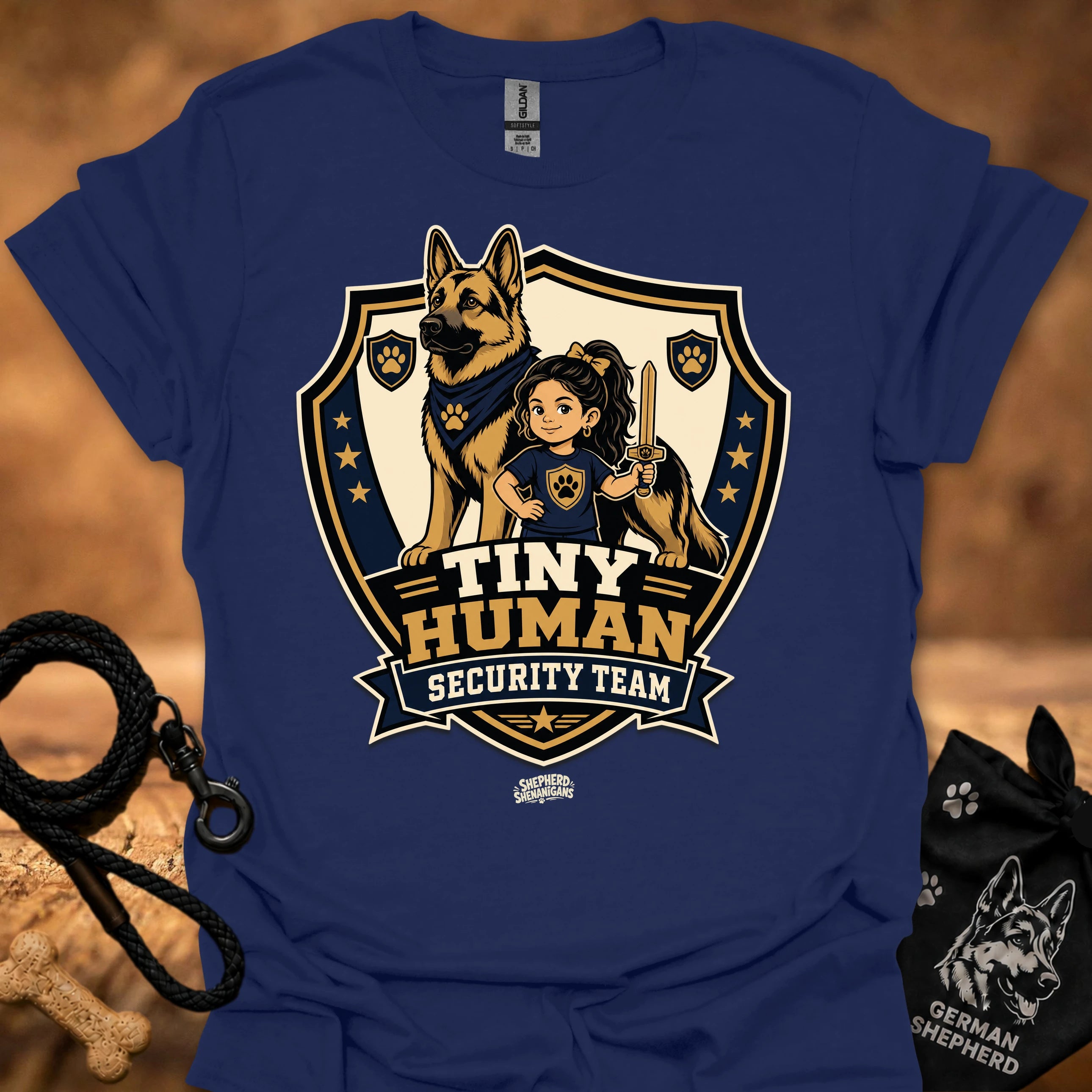 Navy T-shirt with shield mascot graphic and “Tiny Human Security Team” print