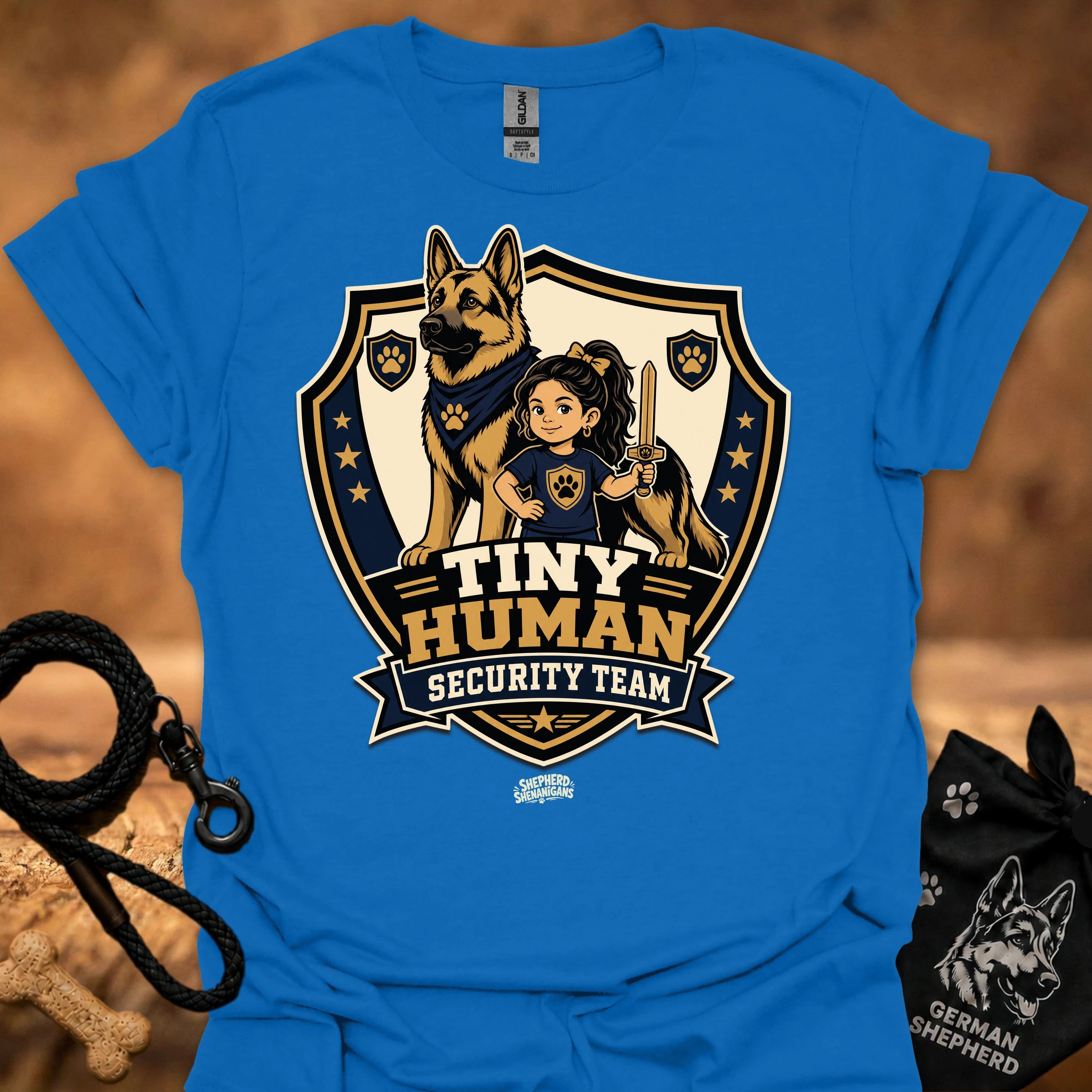 Royal blue T-shirt with shield mascot graphic and “Tiny Human Security Team” print