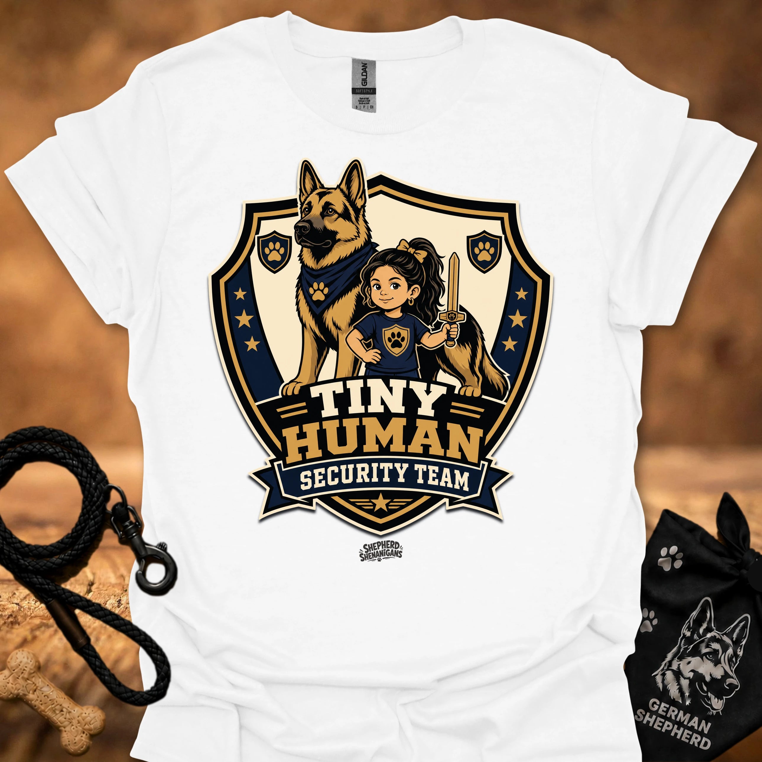 White T-shirt with shield mascot graphic and “Tiny Human Security Team” print