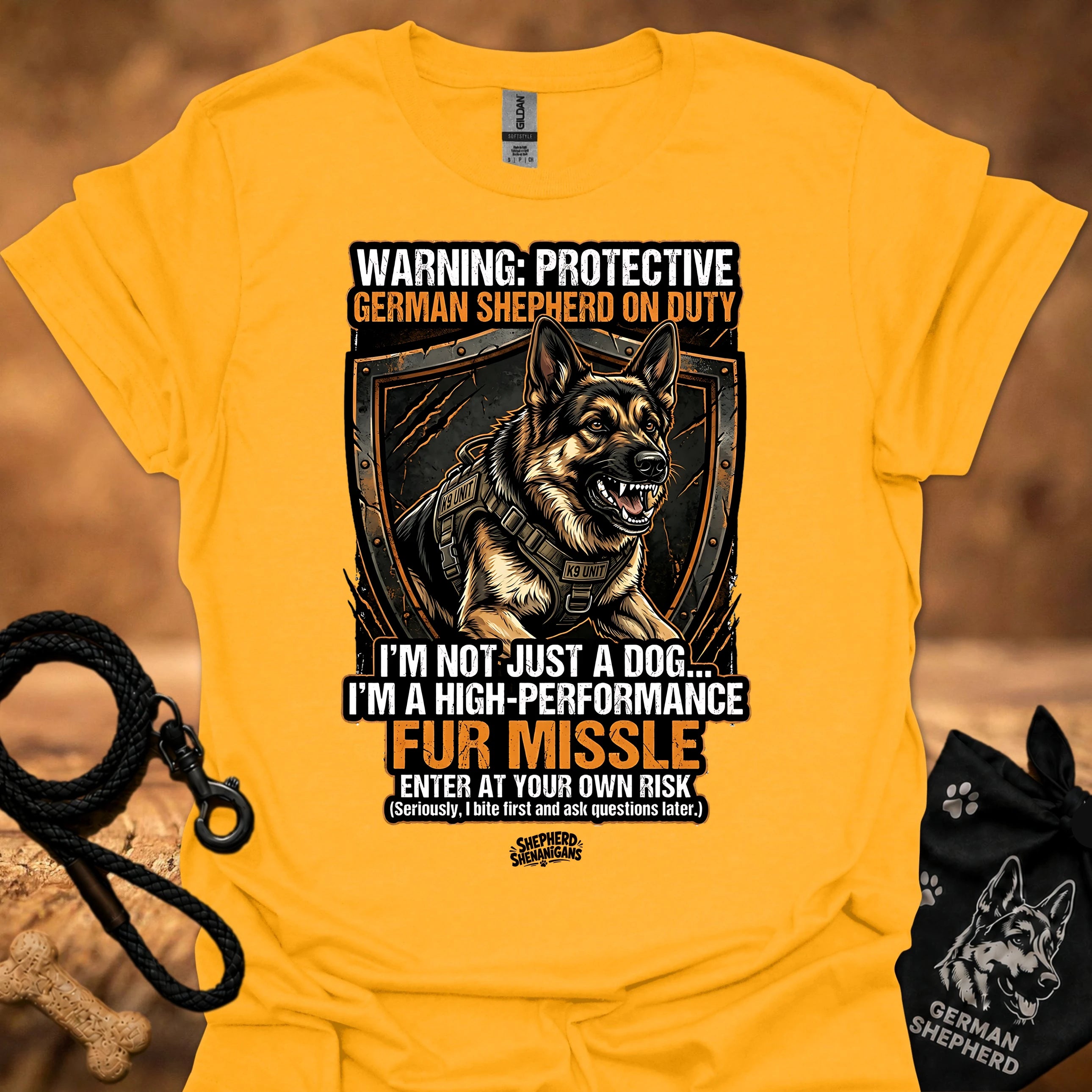 High performance fur missile T-shirt, gold with large dog graphic and warning text