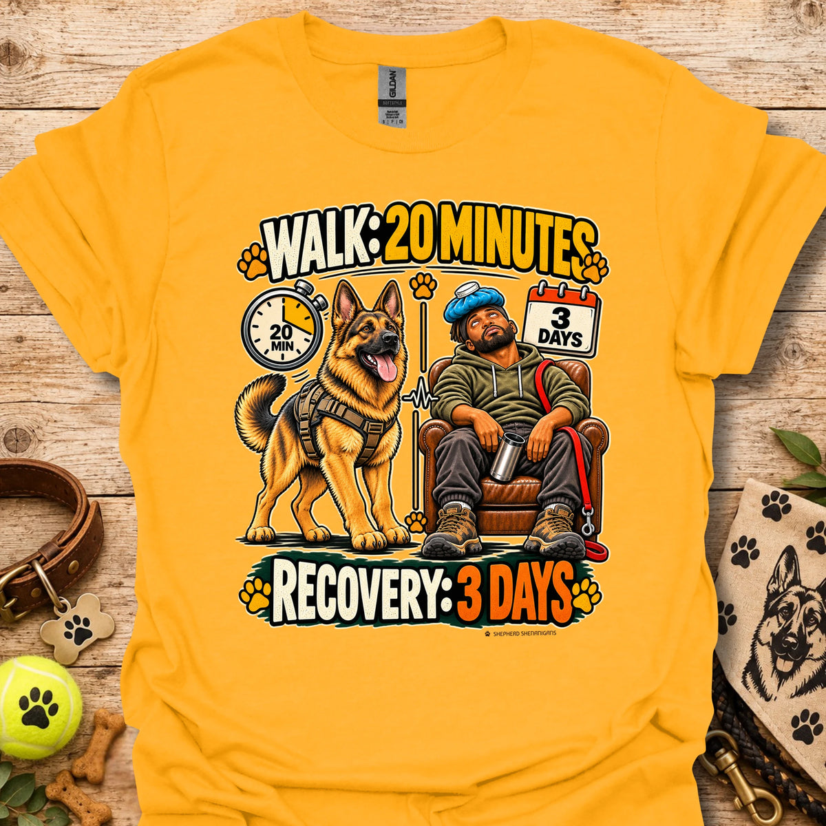 Gold T-shirt with a dog-walking and three-day recovery graphic