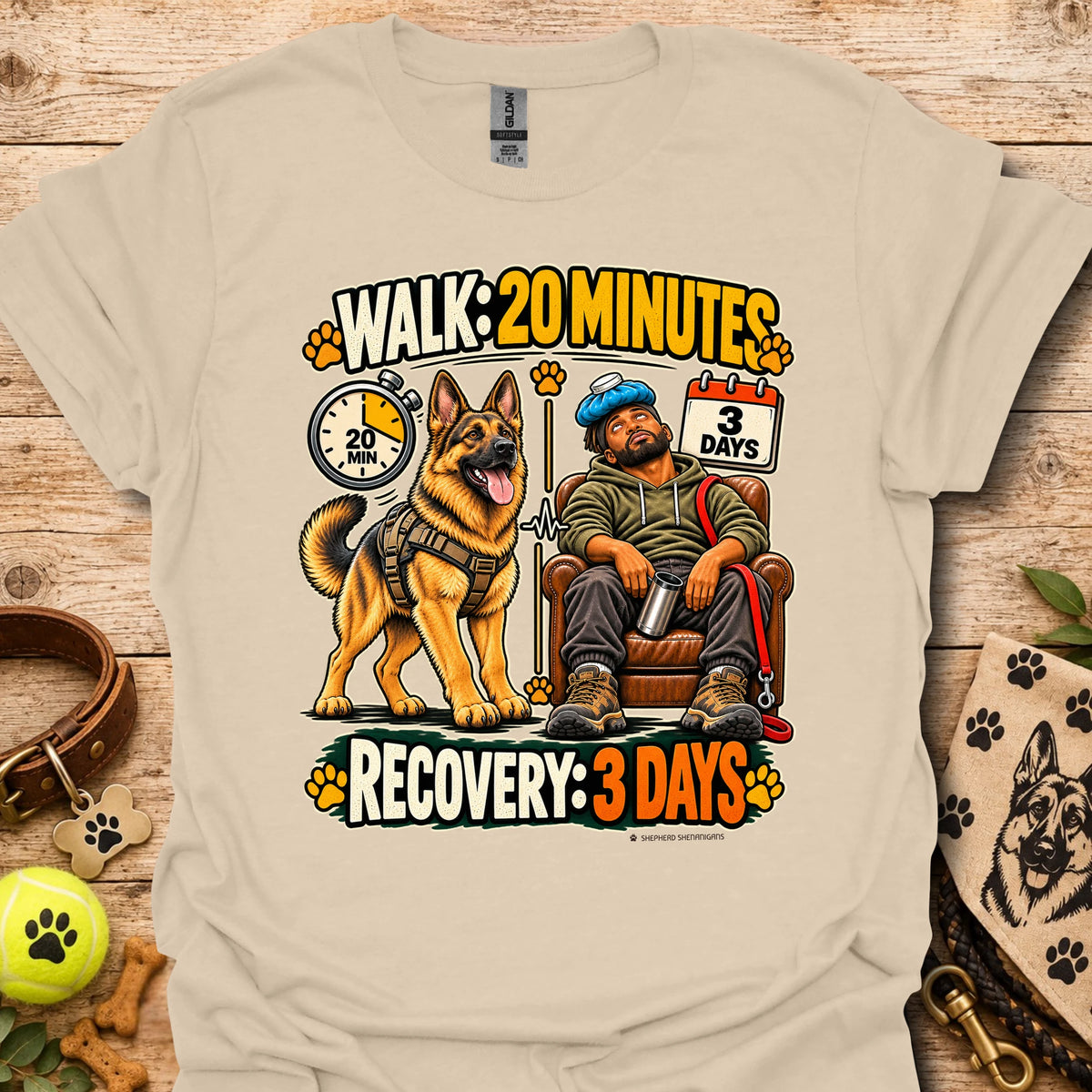 Sand T-shirt with a dog-walking and three-day recovery graphic