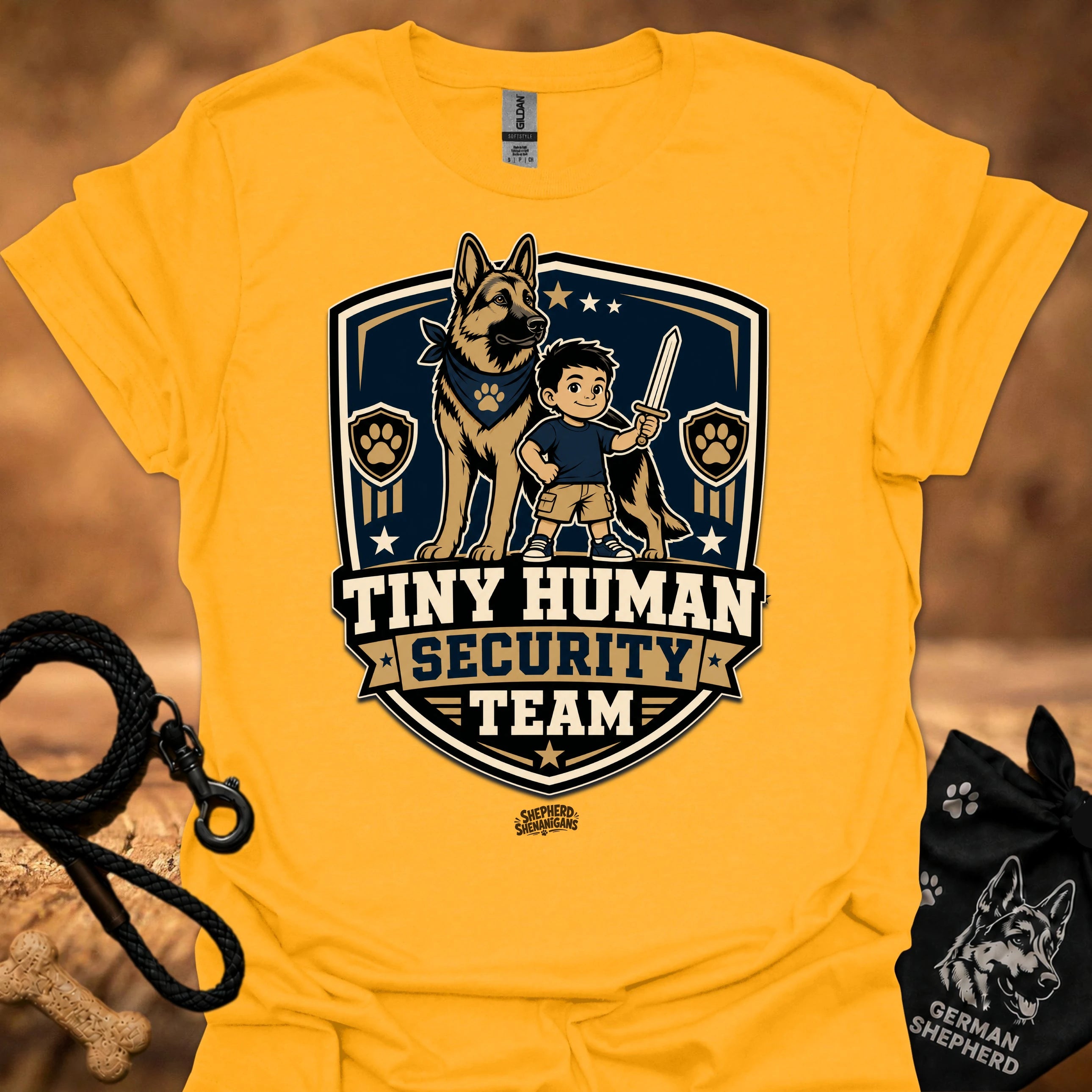 Gold crew-neck T-shirt with boy and German shepherd security team badge