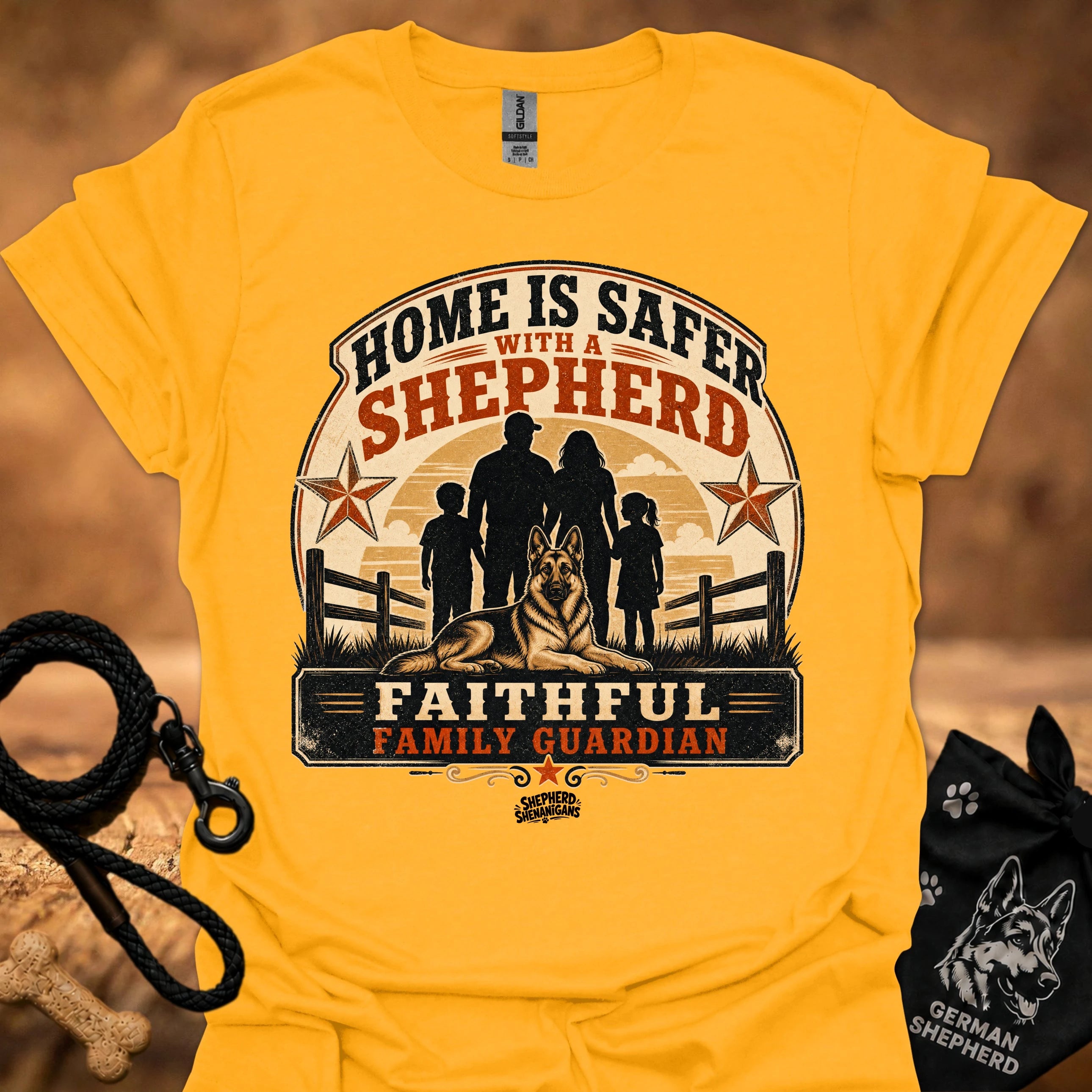 Gold crew-neck T-shirt with "Home is safer with a shepherd" front graphic