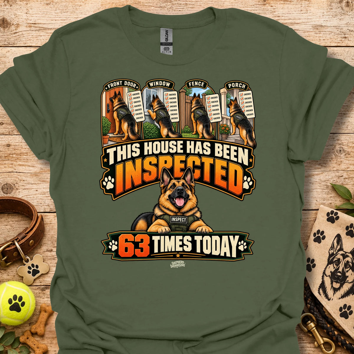 Military green T-shirt with inspected-house graphic: dog, badges, 63 times today text