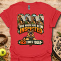 Red T-shirt with inspected-house graphic: dog, badges, 63 times today text