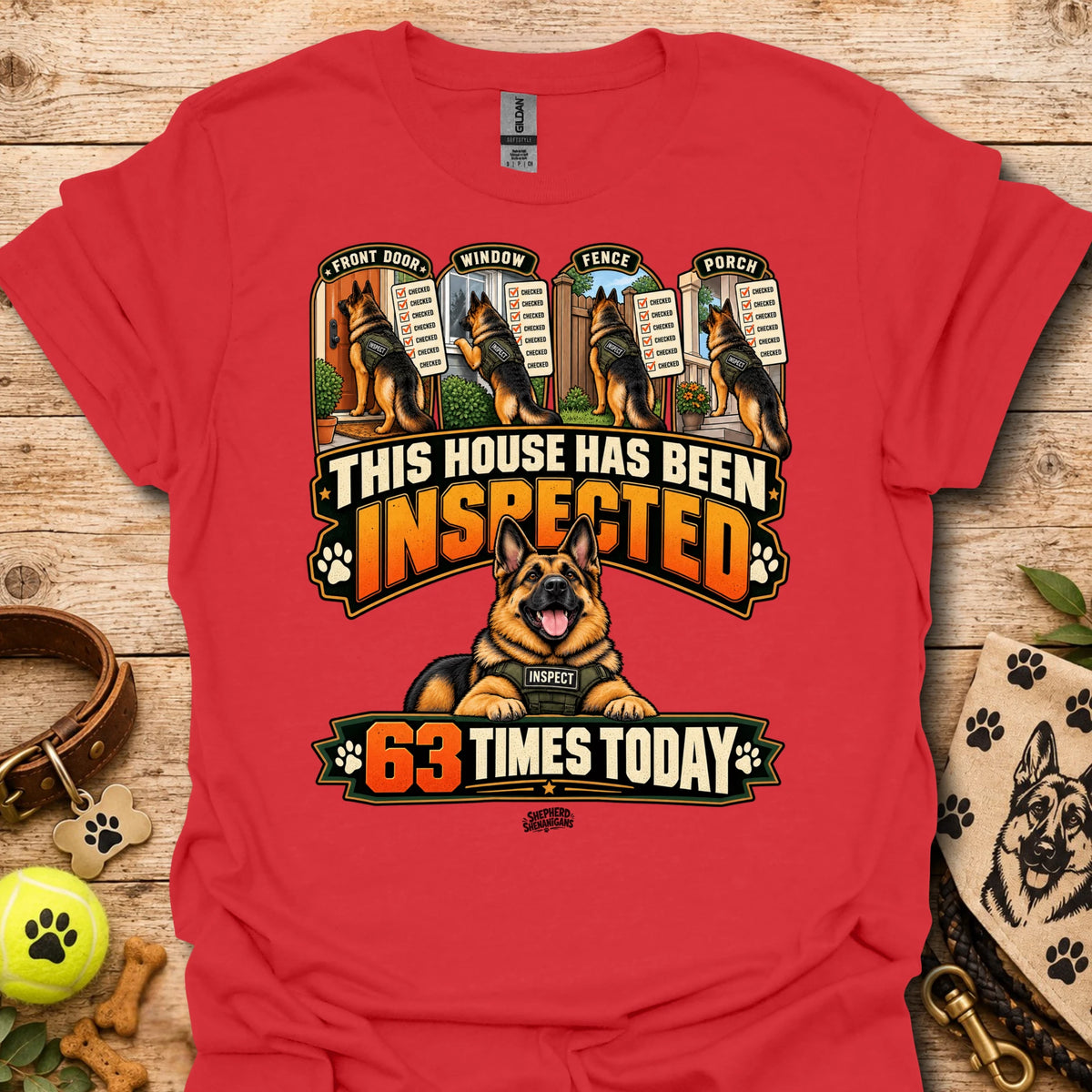 Red T-shirt with inspected-house graphic: dog, badges, 63 times today text