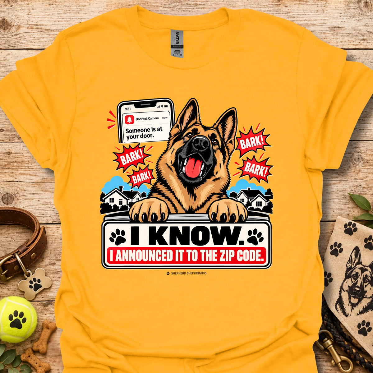 Gold dog graphic t-shirt with German shepherd, paw prints, and “I KNOW” text
