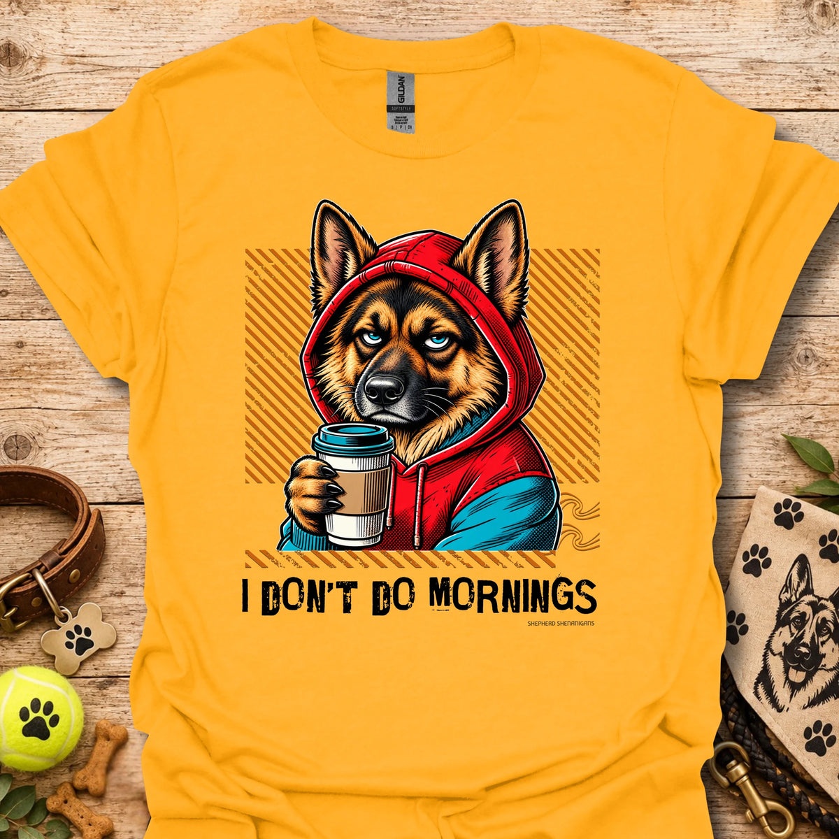 Gold crew-neck T-shirt with German shepherd graphic holding a coffee mug in a hoodie