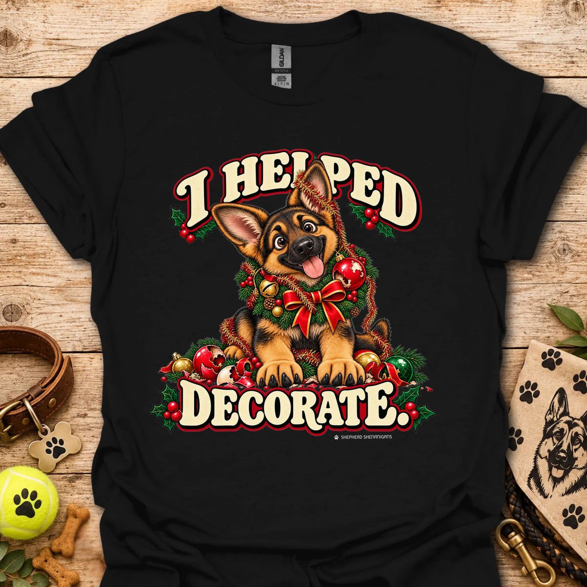Black T-shirt with festive cartoon dog and holiday text graphic on front