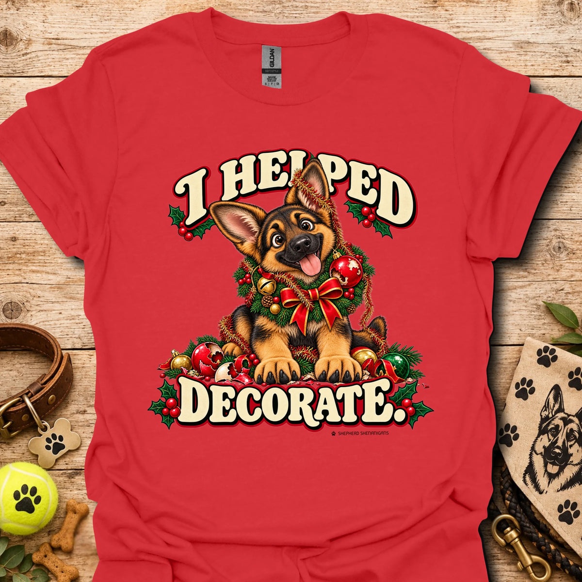 Red T-shirt with festive cartoon dog and holiday text graphic on front